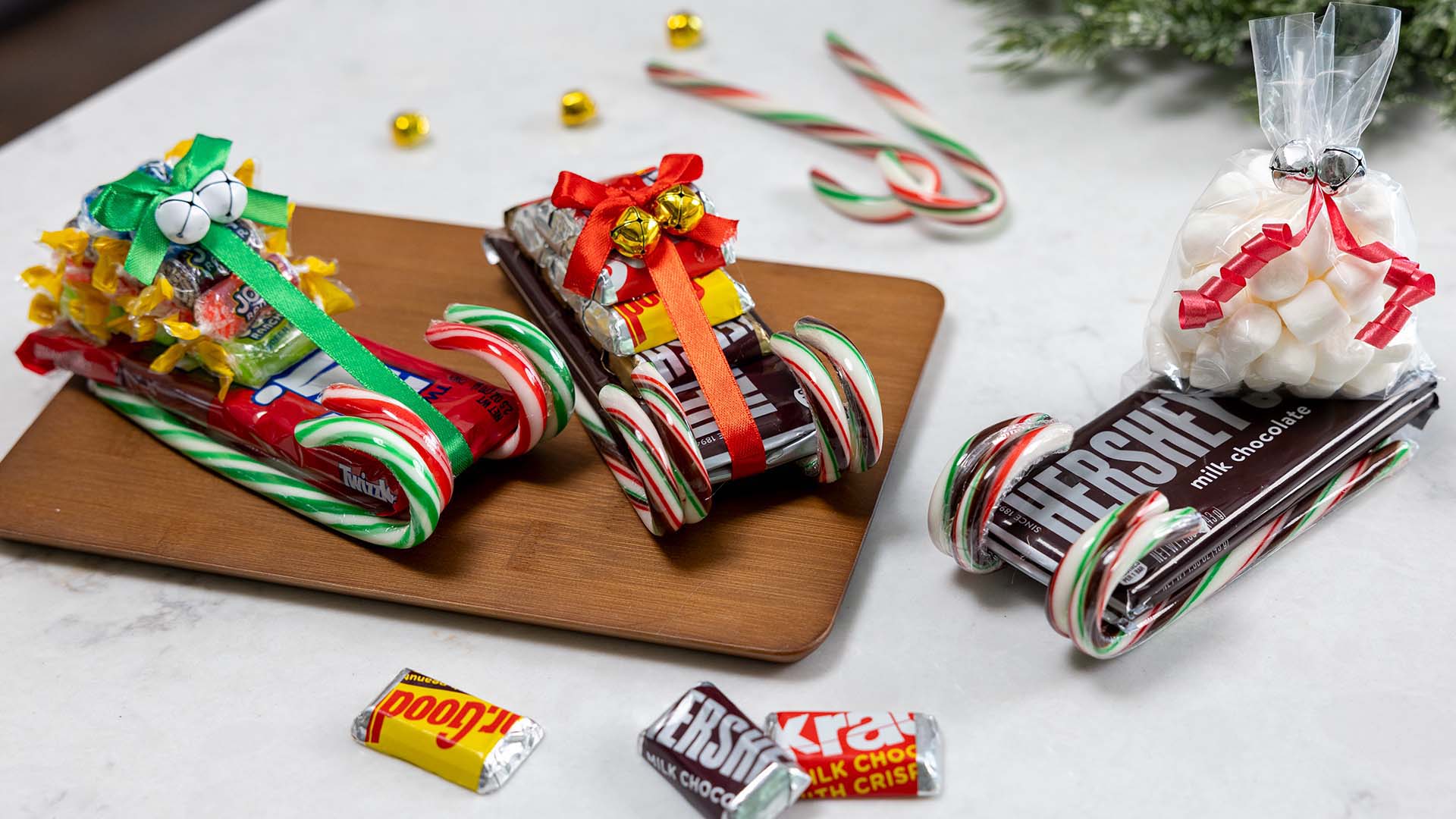 set of candy sleighs made with an assortment of hersheys products