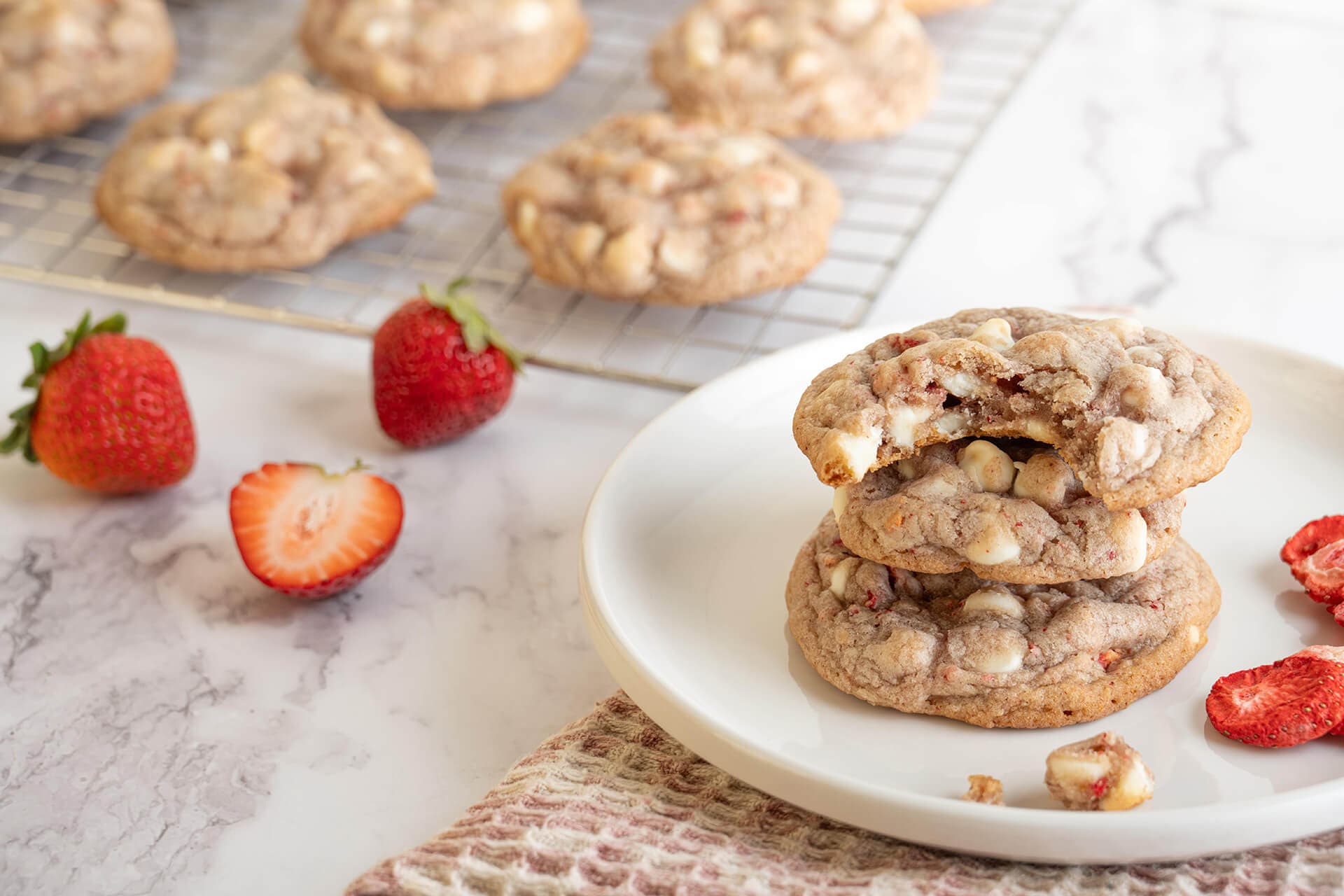 tray of freshly made strawberries and cream cookies